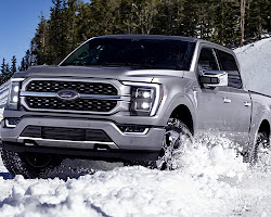 Ford F-150 truck in snow