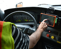 Truck driver using a tablet